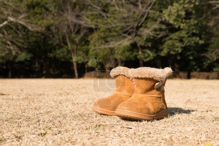 Photo for Boots for child in sunny day - Royalty Free Image