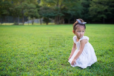 Photo for Girl playing in the park - Royalty Free Image