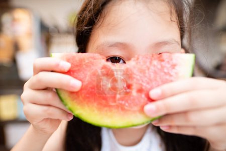 Photo for Girl with a watermelon eaten - Royalty Free Image