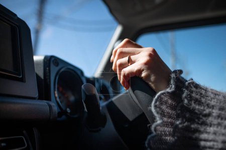 Photo for Woman's hands driving a car - Royalty Free Image