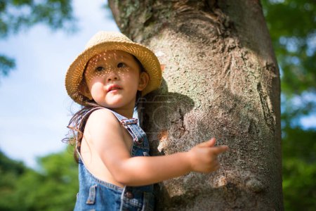 Photo for Girl to climb a tree - Royalty Free Image