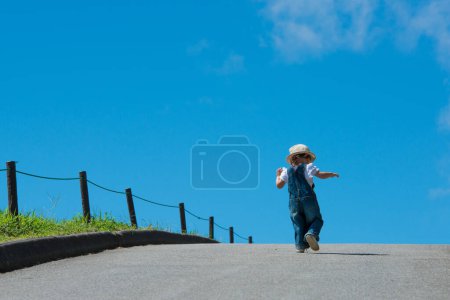 Photo for Blue sky and a girl - Royalty Free Image