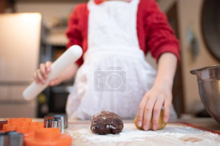 Photo for Girl making cookies at home - Royalty Free Image