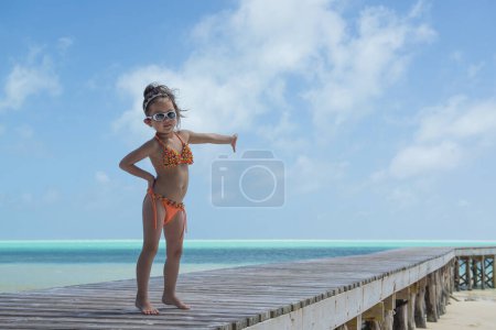 Photo for Cute girl at beach during summer vacation - Royalty Free Image