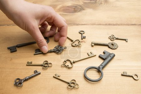 Photo for Hand with an old keys - Royalty Free Image