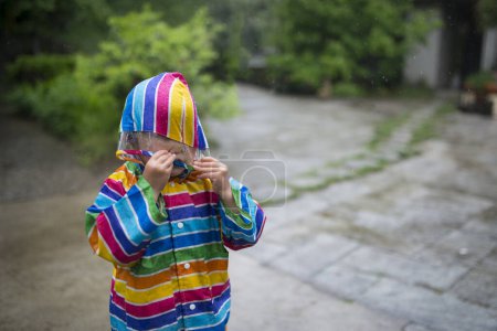 Photo for Girl wearing a raincoat - Royalty Free Image