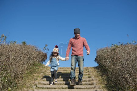 Photo for Father and daughter playing in the park - Royalty Free Image