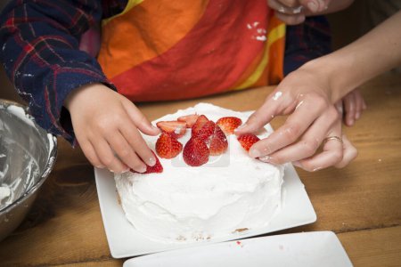 Photo for Happy little girl making cake - Royalty Free Image