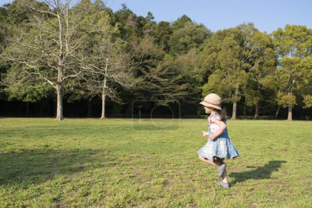 Photo for Girl running in the park - Royalty Free Image
