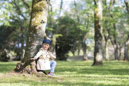 Photo for Young girl in a green forest - Royalty Free Image