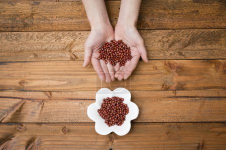 Photo for Woman's hands with azuki beans - Royalty Free Image