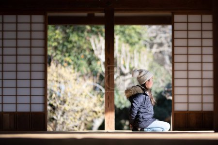 Photo for A child sitting in a Japanese-style room - Royalty Free Image