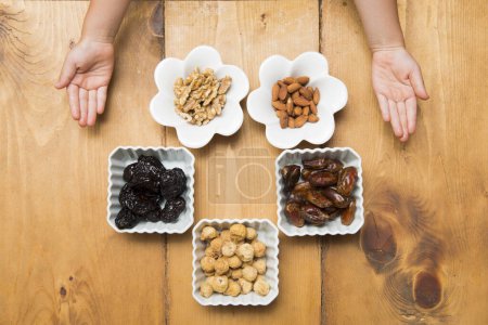 Nuts and dried fruits on table