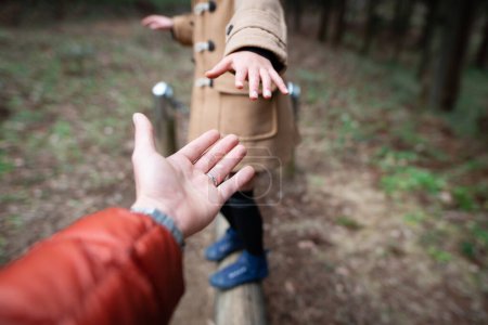 Photo for Father and daughter hands playing in the park - Royalty Free Image