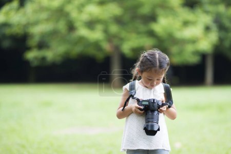 Photo for Happy Little Girl taking picture - Royalty Free Image
