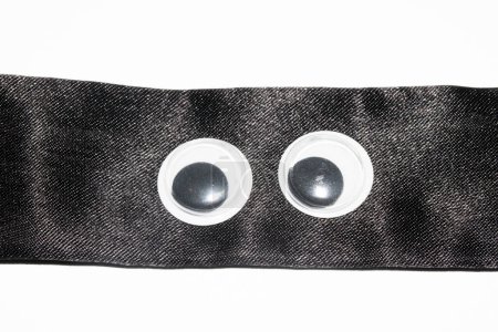 Photo for A Funny Wiggle Google Eyes on Fabric Silly Background - Royalty Free Image