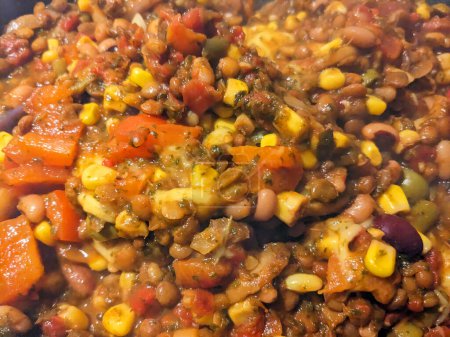A Close Up of Vegan Stew in a Pan with Lentils and Vegetables and Beans Healthy Meal