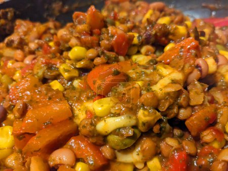 Photo for A Close Up of Vegan Stew in a Pan with Lentils and Vegetables and Beans Healthy Meal - Royalty Free Image
