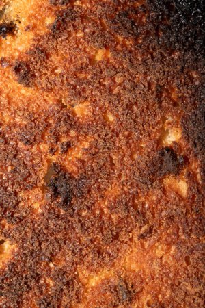 Un pain très brûlé pain pain grillé Fermer Texture