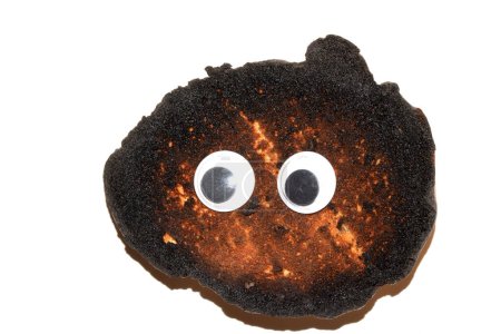 A Funny Burnt Toast Bread Roll With Googly Wobble Eyes