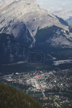 Photo for Banff, is a picturesque town nestled within the stunning landscapes of Alberta, Canada. Its natural beauty, coupled with opportunities for outdoor adventures like hiking and skiing, makes Banff a sought-after destination for nature enthusiasts. - Royalty Free Image