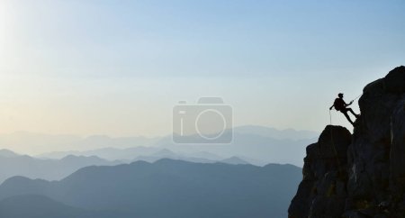 Photo for Challenging and Steep Climbing Mountaineer - Royalty Free Image