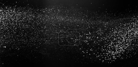 Photo for Freezing falling particles or stardust in air on black background for overlay blending mode. Stopping the movement of white powder on a dark background, selective focus, wide banner - Royalty Free Image
