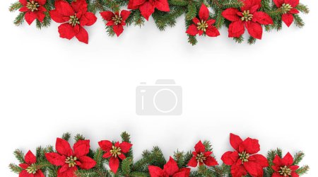 Foto de Guirnalda de Feliz Navidad hecha de ramas de abeto y flores rojas festivas sobre fondo blanco. Feliz Año Nuevo y Navidad, vista superior, bandera ancha - Imagen libre de derechos