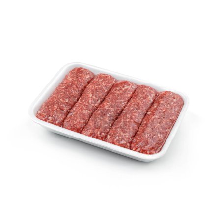Foto de Embutidos de carne cruda en caserola aislados sobre fondo blanco. Comida de carne, vista superior - Imagen libre de derechos