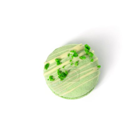Photo for Green pistachio macaroon cookie isolated on white background. Candy bar, sweets and dessert, top view - Royalty Free Image