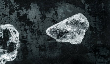 Photo for Piece of crushed ice on dark background. Abstract ice structure background, top view - Royalty Free Image