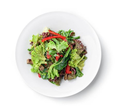 Photo for Healthy salad with grilled beef meat, tomatoes, bell pepper, lettuce, arugula, french bean and sauce in plate isolated on white background. Healthy food, top view - Royalty Free Image