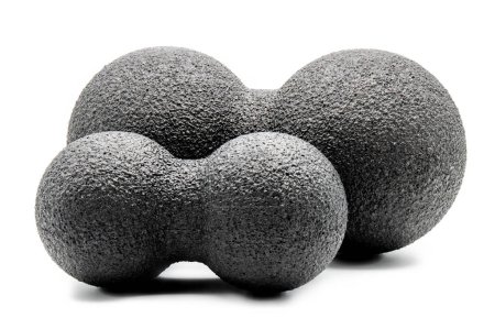 two double fascia balls in front of white background, black color, product