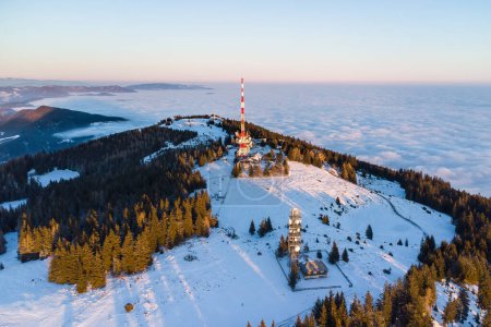 Photo for Aerial view of the mountain plateau of the Schoeckl mountain near Graz on a beautiful winter evening - Royalty Free Image