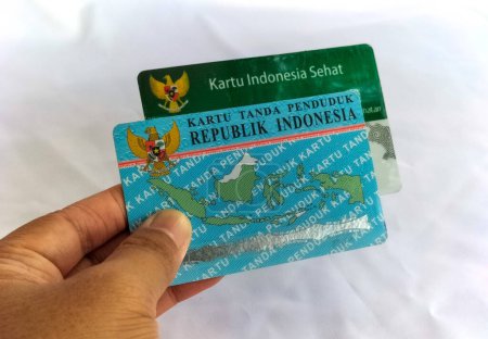 Selectif focus. KTP (resident identity card) and health BPJS card isolated on white background.