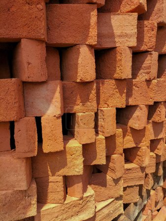 Concentration sélective. Quelques briques rouges (batu bata), briques rouges sont l'un des matériaux de construction de base.