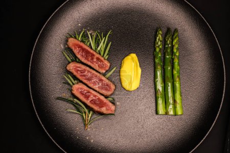 Photo for Polish beef tataki with asparagus and pickled lemon mayo - Royalty Free Image