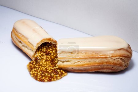Eclairs and cakes with unusual filling. Filled with hot sauce, mustard and wasabi. It's an unusual and strange combination of flavors