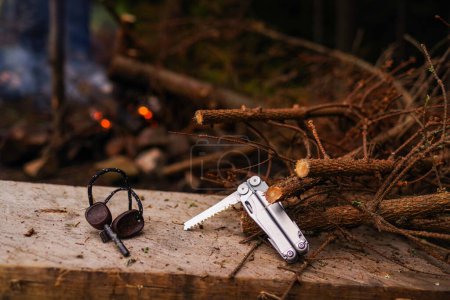 Hiking tool. Pocket tool. Light a fire in the forest.