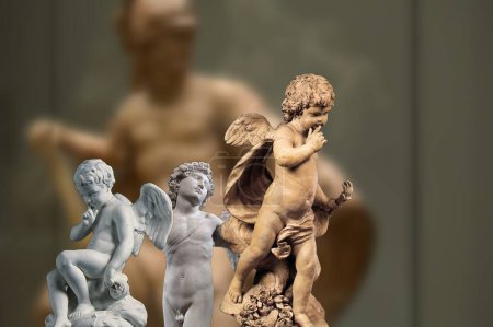 Depiction of authentic statues of ancient Rome of Cupid god of divine love 