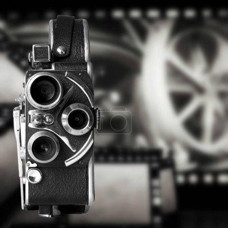 A Vintage Video Camera on the background of old films 