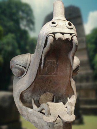 Photo for Olmec snake head, The snake was an important motif in the Olmec civilization. It was associated with water, fertility and rebirth. The serpent was also seen as a powerful symbol of power and authority - Royalty Free Image