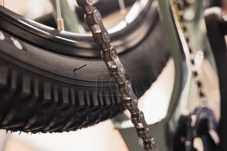 Photo for Detail shot of chain and bicycle tire seen from below - Royalty Free Image