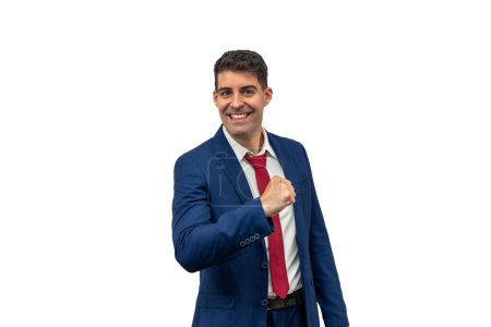 triumph of a smiling businessman as he clenches his fist with a victorious expression of success and achievement. With confidence and pride, he exudes corporate triumph and professional satisfaction white background