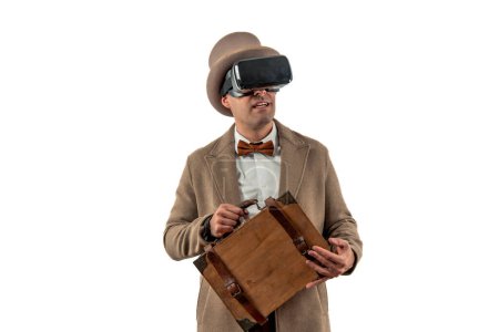 vintage man donning bowler hat and trench coat, adding a touch of nostalgia to his attire. Witness his fascination as he explores virtual reality through VR glasses, blending the past with the future