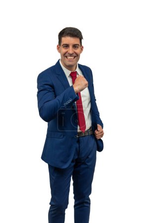 vertical triumph of a smiling businessman as he clenches his fist with a victorious expression of success and achievement. With confidence and pride, he exudes corporate triumph and professional satisfaction white background