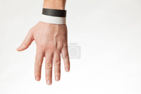 Photo for Black and white version of blank bracelet on hand. Paper festival branding wristband, mockup. - Royalty Free Image
