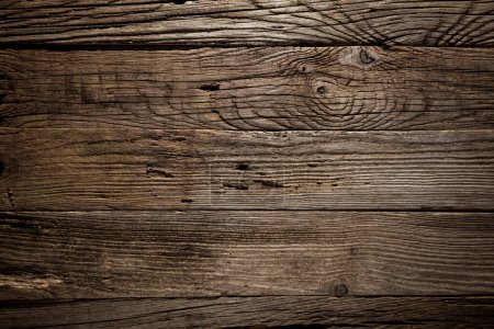 Photo for Old wooden table with cracks and scratches, aged rustic background. - Royalty Free Image
