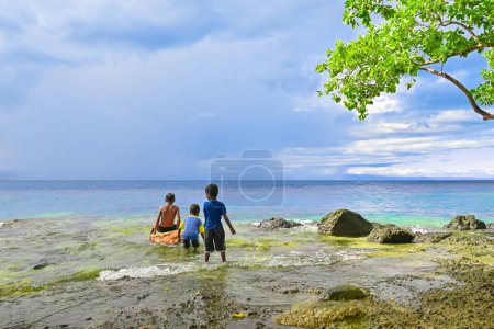 Photo for Children playing on the beach - Royalty Free Image