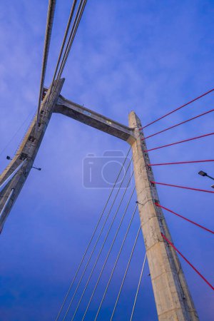Red and white bridge construction, Ambon, Indonesia